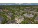 Aerial view of an attractive townhome surrounded by lush greenery in a desirable neighborhood at 1425 Chatfield Pl, Orlando, FL 32814