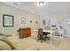 Office space with neutral colored walls, sofa, and desk at 1425 Chatfield Pl, Orlando, FL 32814
