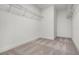 Walk-in closet with carpeted floor and wire shelving for optimal organization at 14613 Erice Ave, Clermont, FL 34714