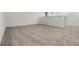 Spacious upstairs room featuring neutral carpeting at 14613 Erice Ave, Clermont, FL 34714