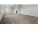 Neutral carpeted room at 14613 Erice Ave, Clermont, FL 34714