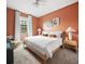 Beautiful bedroom featuring cozy decor, soft lighting, and a comfortable bed setup at 1518 Rolling Fairway Dr, Davenport, FL 33896