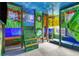 Unique bedroom with a custom bunk bed, built in slide, and colorful decor at 1518 Rolling Fairway Dr, Davenport, FL 33896