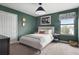 Lovely bedroom featuring a wardrobe closet, natural light, and modern decor at 1518 Rolling Fairway Dr, Davenport, FL 33896