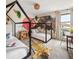 Fun ' bedroom with two twin beds, a tiger rug, and a playful animal-themed wall at 1518 Rolling Fairway Dr, Davenport, FL 33896