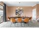 Formal dining room featuring modern lighting, decor and a neutral color scheme at 1518 Rolling Fairway Dr, Davenport, FL 33896