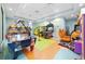 Fun game room with a variety of arcade games, perfect for entertainment and recreation at 1518 Rolling Fairway Dr, Davenport, FL 33896