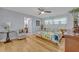 Cozy main bedroom with light walls, hardwood floors, and ensuite access at 1621 Highland Dr, Longwood, FL 32750