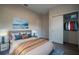 Bedroom with bed, closet, modern decor, and wood-look flooring at 170 Blaine St, Eustis, FL 32726