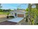 Charming single-Gathering home featuring a well-manicured lawn and a two-car garage at 170 Blaine St, Eustis, FL 32726