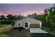 Charming single-Gathering home featuring a well-manicured lawn and a two-car garage at 170 Blaine St, Eustis, FL 32726
