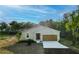 Charming single-Gathering home featuring a well-manicured lawn and a two-car garage at 170 Blaine St, Eustis, FL 32726