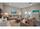 Cozy living room with neutral decor, comfortable seating, and an area rug at 170 Blaine St, Eustis, FL 32726