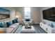 Comfortable living room featuring a plush sofa, armchair, TV, and stylish decor at 170 Blaine St, Eustis, FL 32726