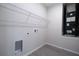 Walk-in closet with installed wire shelving and wood-look floors at 170 Blaine St, Eustis, FL 32726