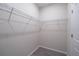 Spacious walk-in closet with installed wire shelving and wood-look floors at 170 Blaine St, Eustis, FL 32726