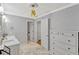 Bathroom featuring a double vanity, a closet and additional storage space at 1710 Alvarado Ct, Longwood, FL 32779