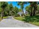 Beautiful home with brick driveway and lush landscaping at 1710 Alvarado Ct, Longwood, FL 32779