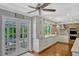 Bright kitchen with white cabinets and stainless steel appliances at 1710 Alvarado Ct, Longwood, FL 32779