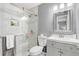 Bathroom with tiled shower and vanity at 1905 Lady Ave, Ocoee, FL 34761