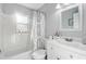 Bathroom featuring a shower and tub combination and a white vanity at 1905 Lady Ave, Ocoee, FL 34761