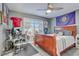 Bedroom with a window, ceiling fan, and decor at 1905 Lady Ave, Ocoee, FL 34761