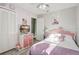 Charming bedroom with natural light, hardwood floors and ample closet space at 1905 Lady Ave, Ocoee, FL 34761
