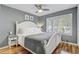 Bedroom showcasing a bed, window, and modern decor at 1905 Lady Ave, Ocoee, FL 34761