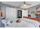 Bedroom featuring a ceiling fan and closet at 1905 Lady Ave, Ocoee, FL 34761