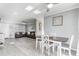 Charming dining area offers hardwood floors and a view of the living room creating an inviting and seamless flow at 1905 Lady Ave, Ocoee, FL 34761