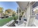 Inviting front porch view with rocking chairs and well-maintained landscaping, perfect for relaxing at 1905 Lady Ave, Ocoee, FL 34761