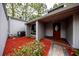 Lovely house with a decorative front door, manicured greenery, and a paved entrance at 207 Sweet Gum Way, Longwood, FL 32779