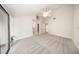 Spacious main bedroom with vaulted ceiling, plush carpet and garden access at 207 Sweet Gum Way, Longwood, FL 32779
