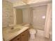 Cozy bathroom featuring a vanity, mirror, toilet, and shower/tub combination at 2100 Shirewood Ct, Winter Park, FL 32792