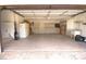 Spacious garage with storage, a washer, and sink for household needs at 2100 Shirewood Ct, Winter Park, FL 32792