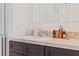 Bathroom vanity with granite countertop, modern faucet, and personal grooming items at 2907 Sime St, New Smyrna Beach, FL 32168