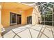 Enclosed patio featuring a ceiling fan, offering a relaxing space with convenient access to the home's interior at 2987 Sabel Oak Pl, Oviedo, FL 32765