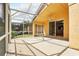 A screened-in patio features a ceiling fan and a view of the pool and property at 2987 Sabel Oak Pl, Oviedo, FL 32765