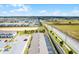 Aerial view of community and townhomes with fenced yards at 301 Jetty Way, Davenport, FL 33897