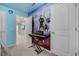 Hallway showcasing a 'Frozen' themed mural and piano in a room at 301 Jetty Way, Davenport, FL 33897