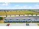 New townhomes with dedicated parking spaces and expansive fields nearby at 301 Jetty Way, Davenport, FL 33897