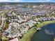 Community aerial view of the clubhouse, lazy river, pool and water slide at 3191 Paradox Cir # 401, Kissimmee, FL 34746