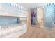 This bedroom features a bunk bed with themed paint and attached bathroom at 321 Falls Dr, Kissimmee, FL 34747