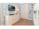 This bedroom features a television, a dresser, and a carpet at 321 Falls Dr, Kissimmee, FL 34747