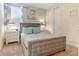 This bedroom features a bed, two nightstands, and carpet at 321 Falls Dr, Kissimmee, FL 34747
