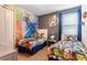 This bedroom features a themed paint job, 2 beds, and carpet at 321 Falls Dr, Kissimmee, FL 34747