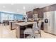 Spacious kitchen with a large island, stainless appliances, and an open-concept layout at 321 Falls Dr, Kissimmee, FL 34747