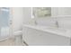 Elegant bathroom features a vanity with dual sinks and a large mirror at 345 W Hornbeam Dr, Longwood, FL 32779