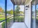 Relaxing screened porch providing a peaceful outdoor space with neighborhood views at 3700 Idlebrook Cir # 114, Casselberry, FL 32707