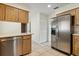 Charming kitchen featuring stainless steel appliances and light wood cabinetry at 3994 Irma Shores Dr, Orlando, FL 32817